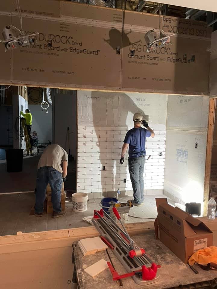 Tile prep and layout on commercial job site by Sisson Tile crew by Sisson Tile