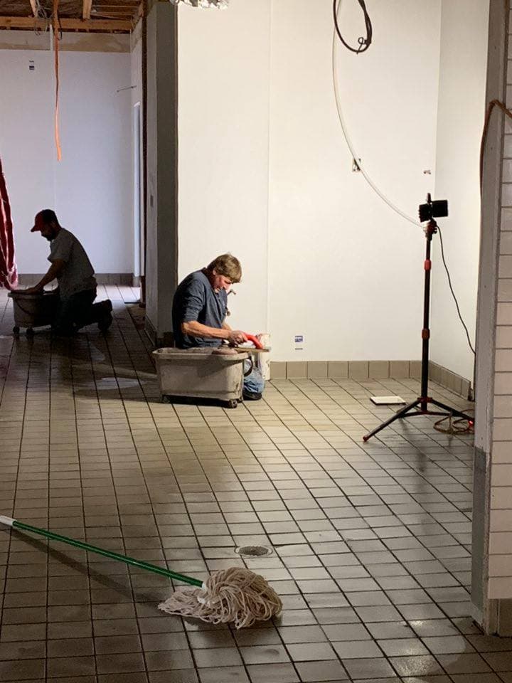 Large-format floor tile installation — commercial project by Sisson Tile