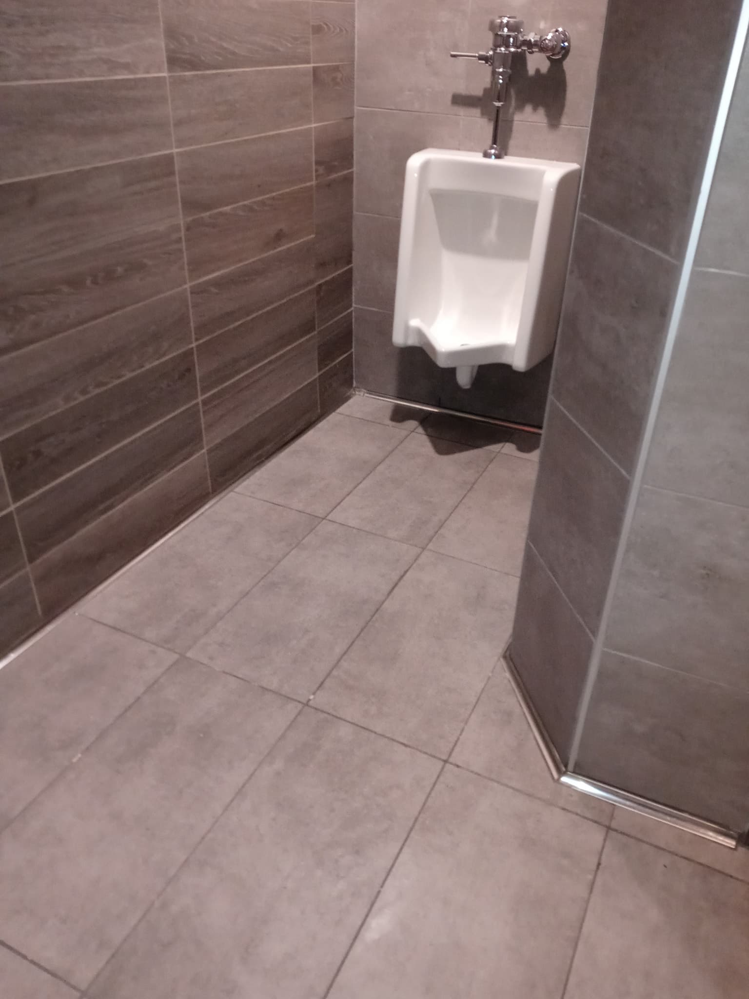 Commercial restroom tile work by Sisson Tile — durable, easy to maintain by Sisson Tile