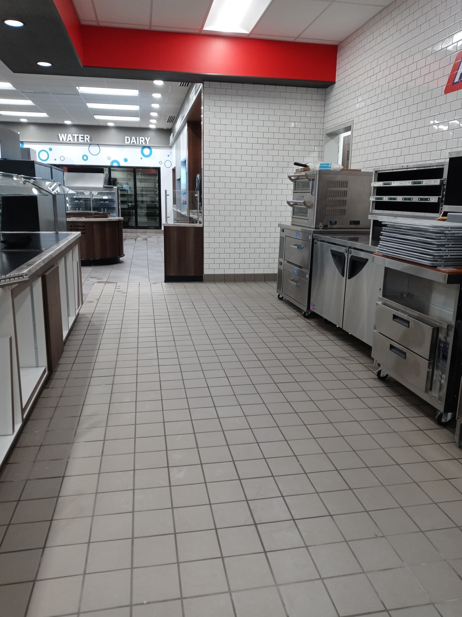 Restaurant back-of-house tile work and epoxy grout by Sisson Tile — health code ready by Sisson Tile