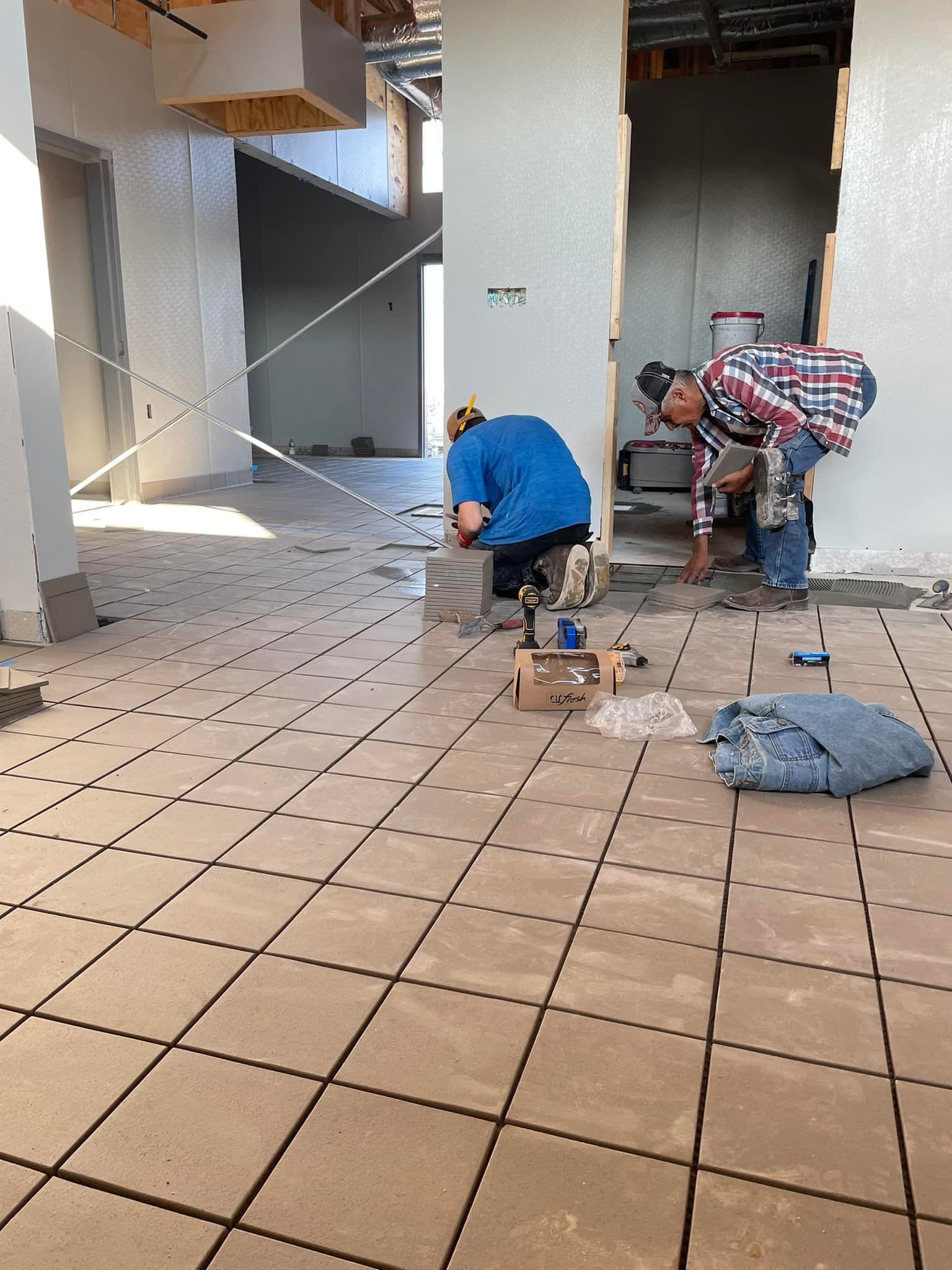 Commercial restaurant tile installation by Sisson Tile — dining area floor and walls by Sisson Tile