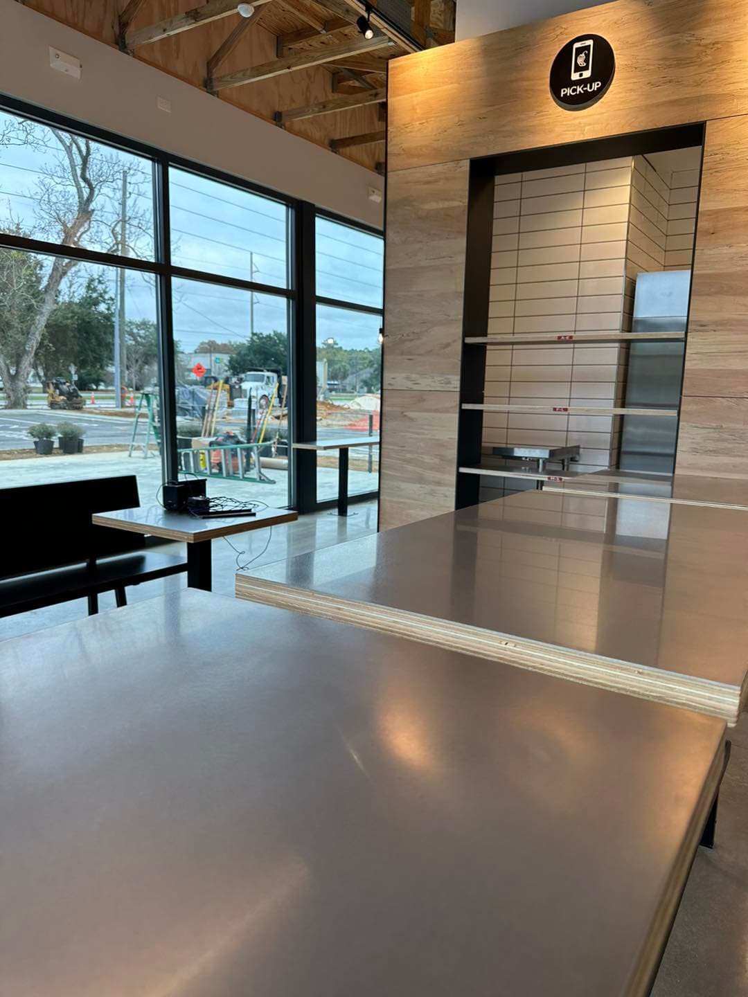 Large-format floor tile installation — commercial project by Sisson Tile