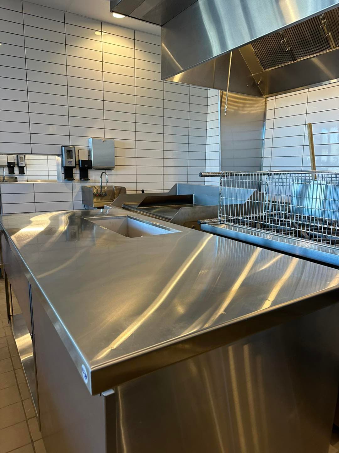Commercial kitchen tile work completed by Sisson Tile — health code compliant by Sisson Tile