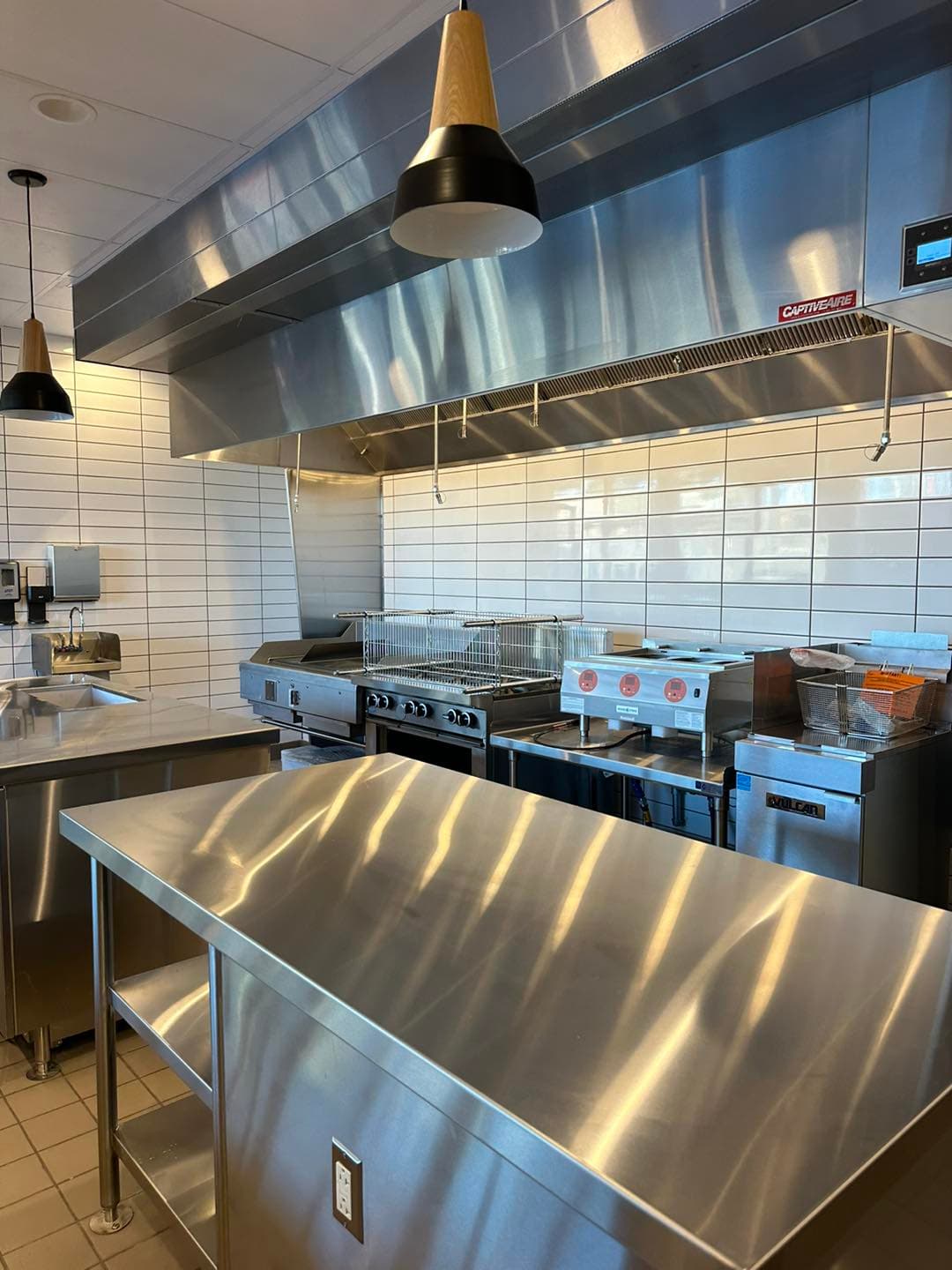 Tile installation in progress — Sisson Tile crew on active commercial job site by Sisson Tile