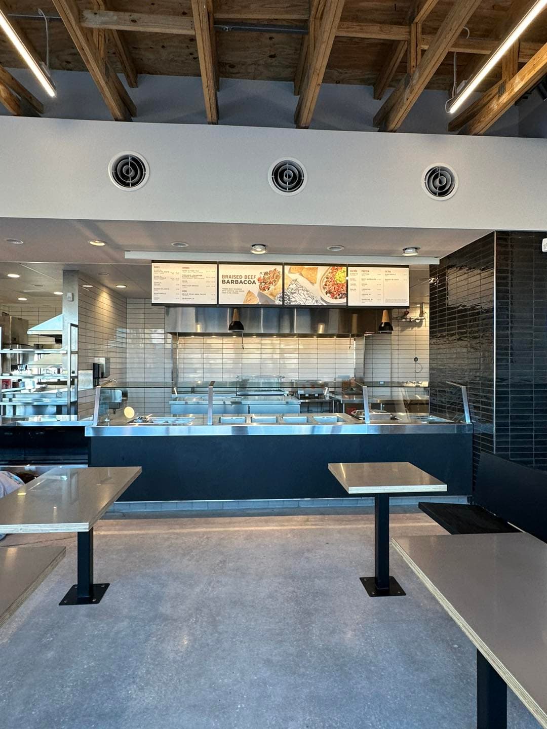 Finished commercial tile floor — large format, clean lines, Sisson Tile by Sisson Tile