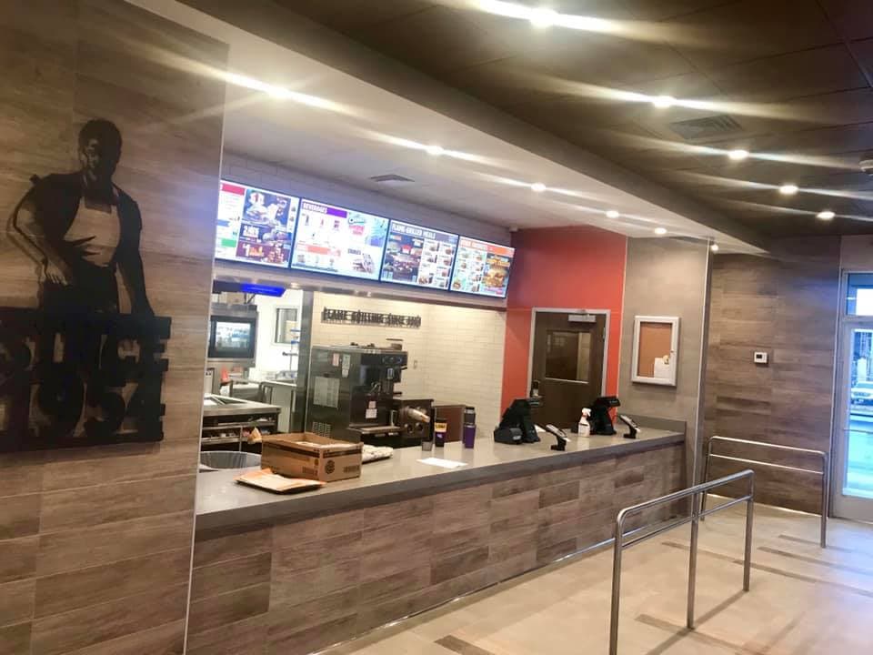 Large-format floor tile installation — commercial project by Sisson Tile