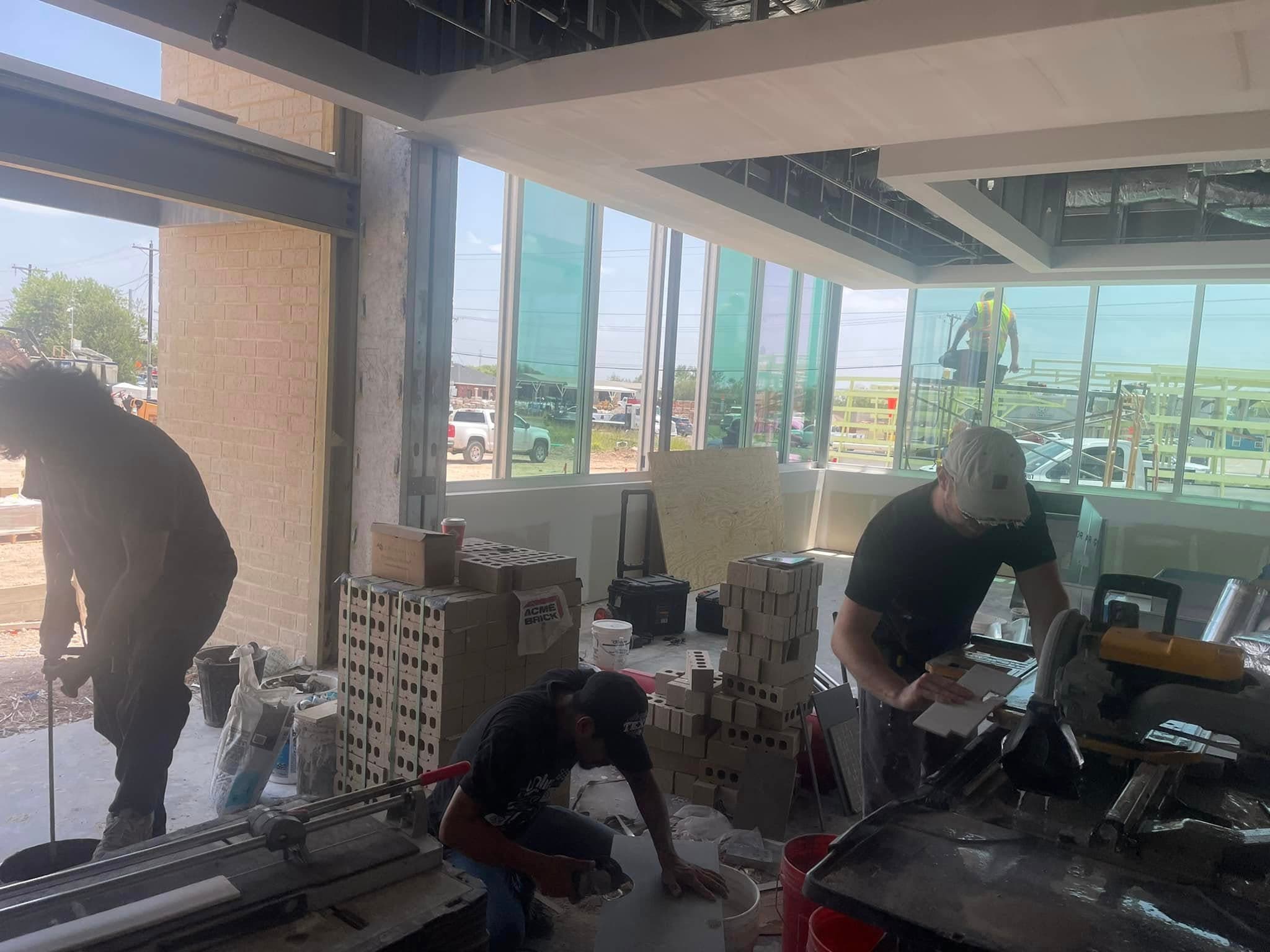 Commercial restaurant tile installation by Sisson Tile — dining area floor and walls by Sisson Tile