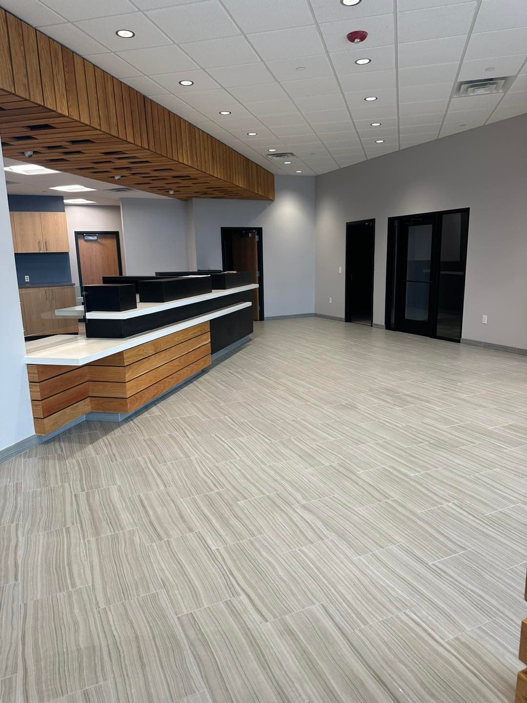 Restaurant floor tile installation in progress by Sisson Tile crew by Sisson Tile