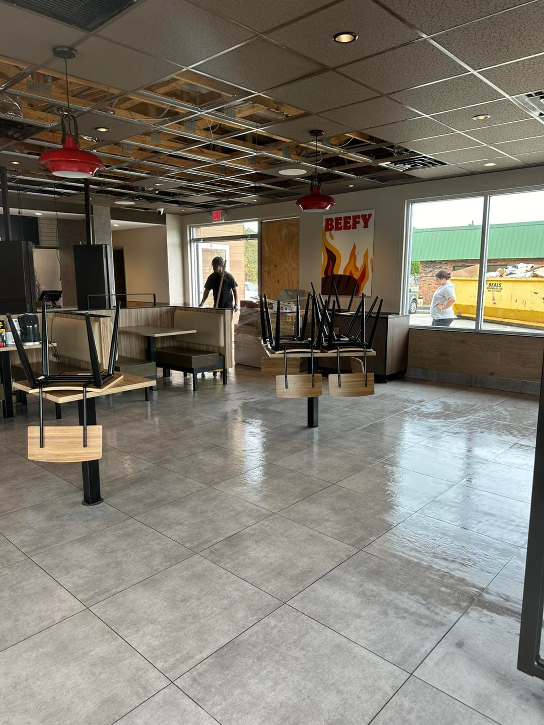 Commercial restaurant tile installation by Sisson Tile — dining area floor and walls by Sisson Tile