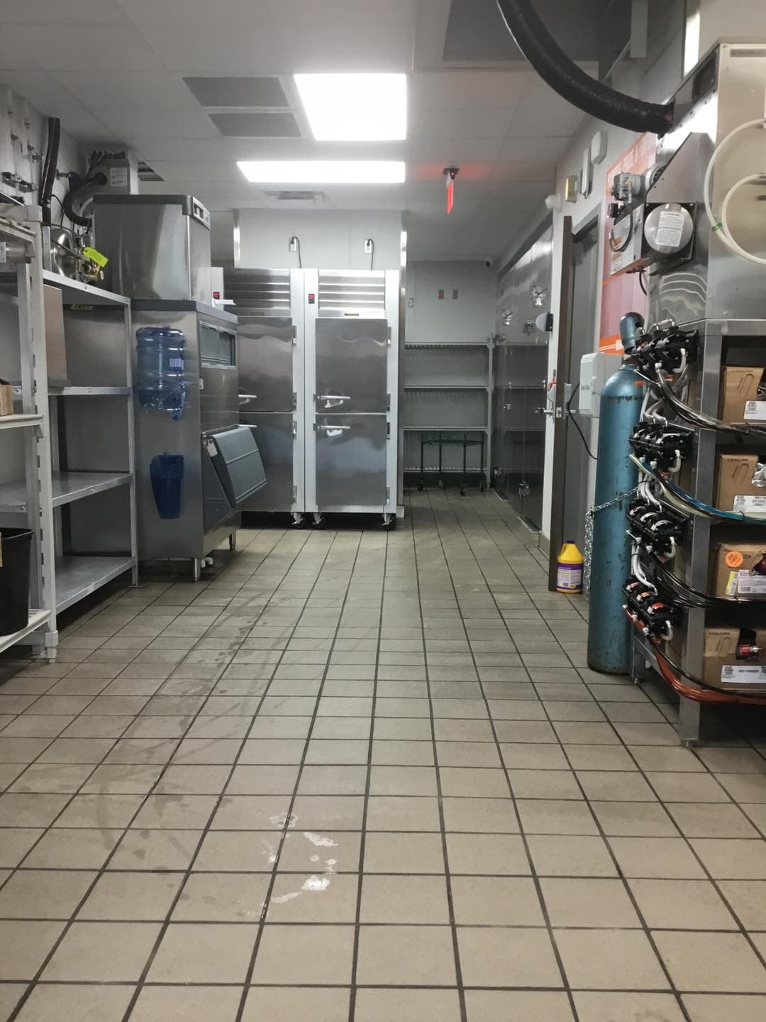 Commercial kitchen tile work completed by Sisson Tile — health code compliant by Sisson Tile
