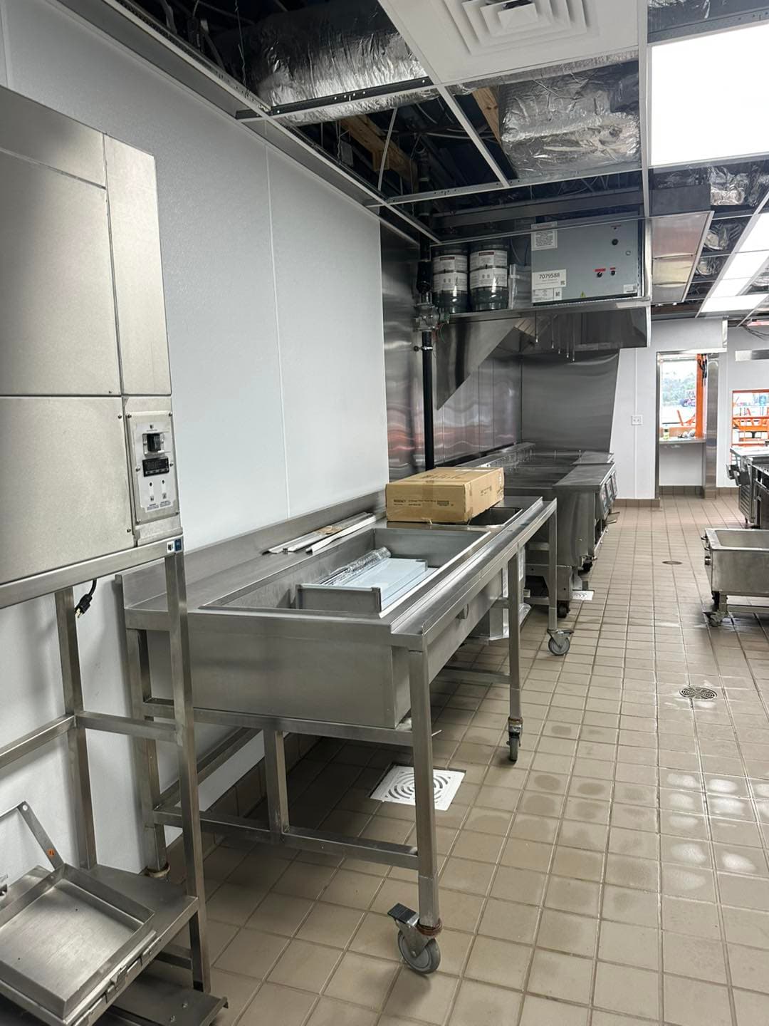 Commercial restaurant tile installation by Sisson Tile — dining area floor and walls by Sisson Tile