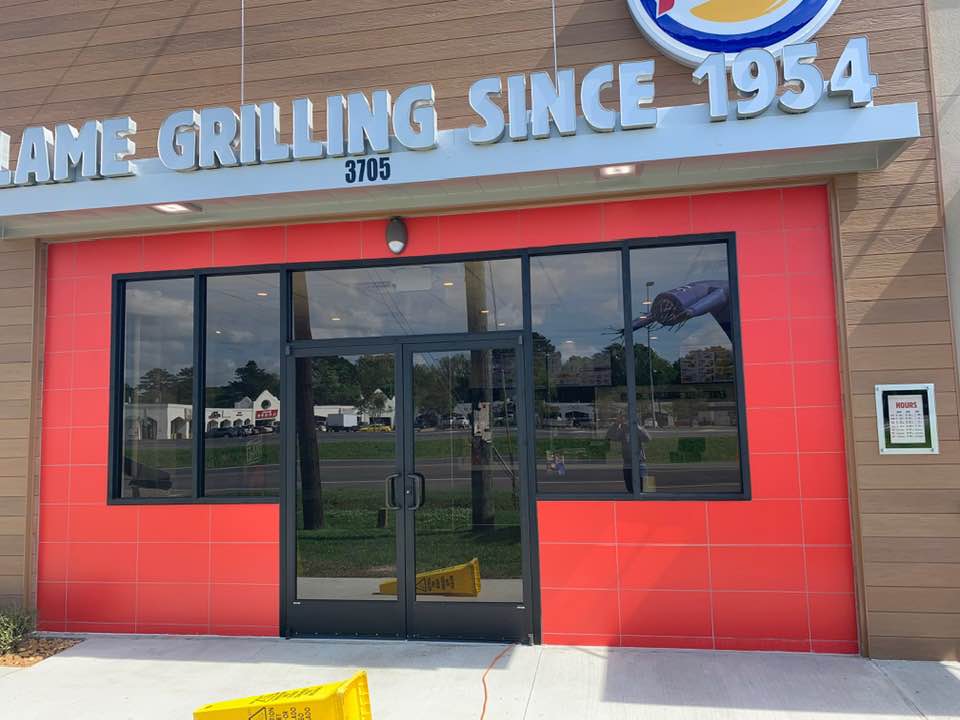 Commercial restaurant tile installation by Sisson Tile — dining area floor and walls by Sisson Tile
