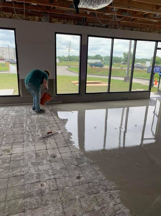 Restaurant floor tile installation in progress by Sisson Tile crew by Sisson Tile