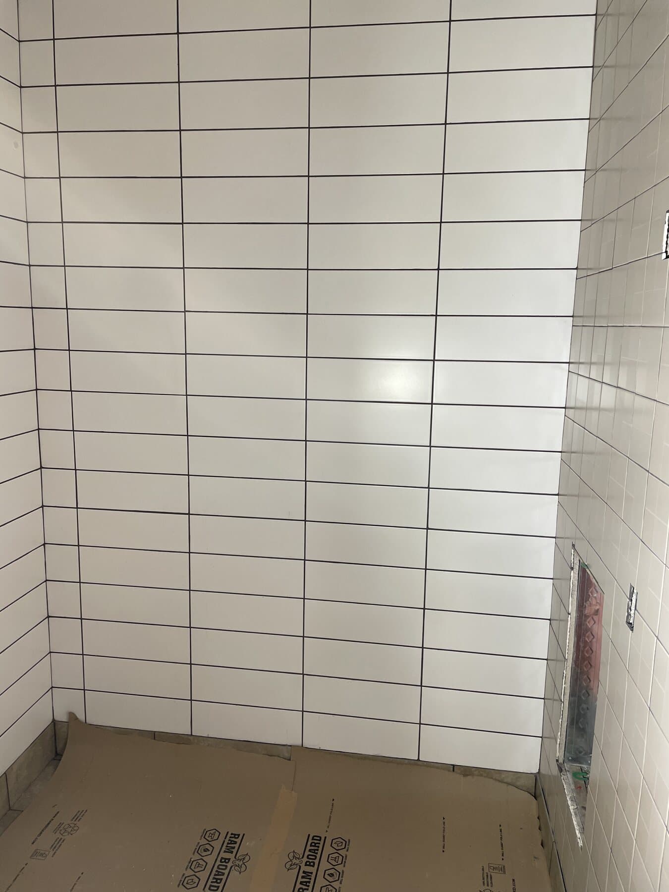 Tile prep and layout on commercial job site by Sisson Tile crew by Sisson Tile