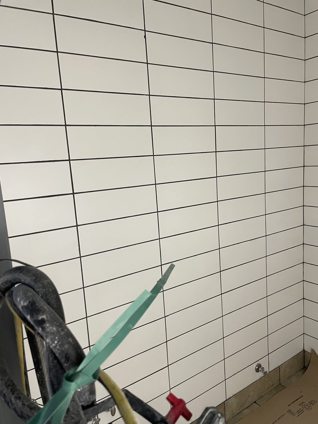 Commercial restaurant tile installation by Sisson Tile — dining area floor and walls by Sisson Tile