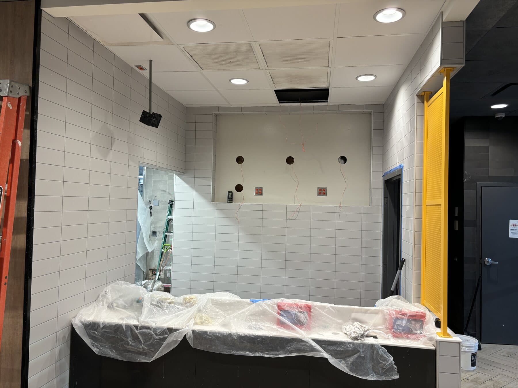 Finished commercial tile floor — large format, clean lines, Sisson Tile by Sisson Tile