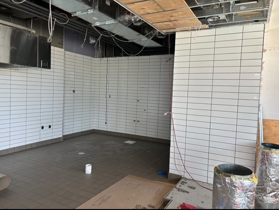 Commercial restroom tile work by Sisson Tile — durable, easy to maintain by Sisson Tile