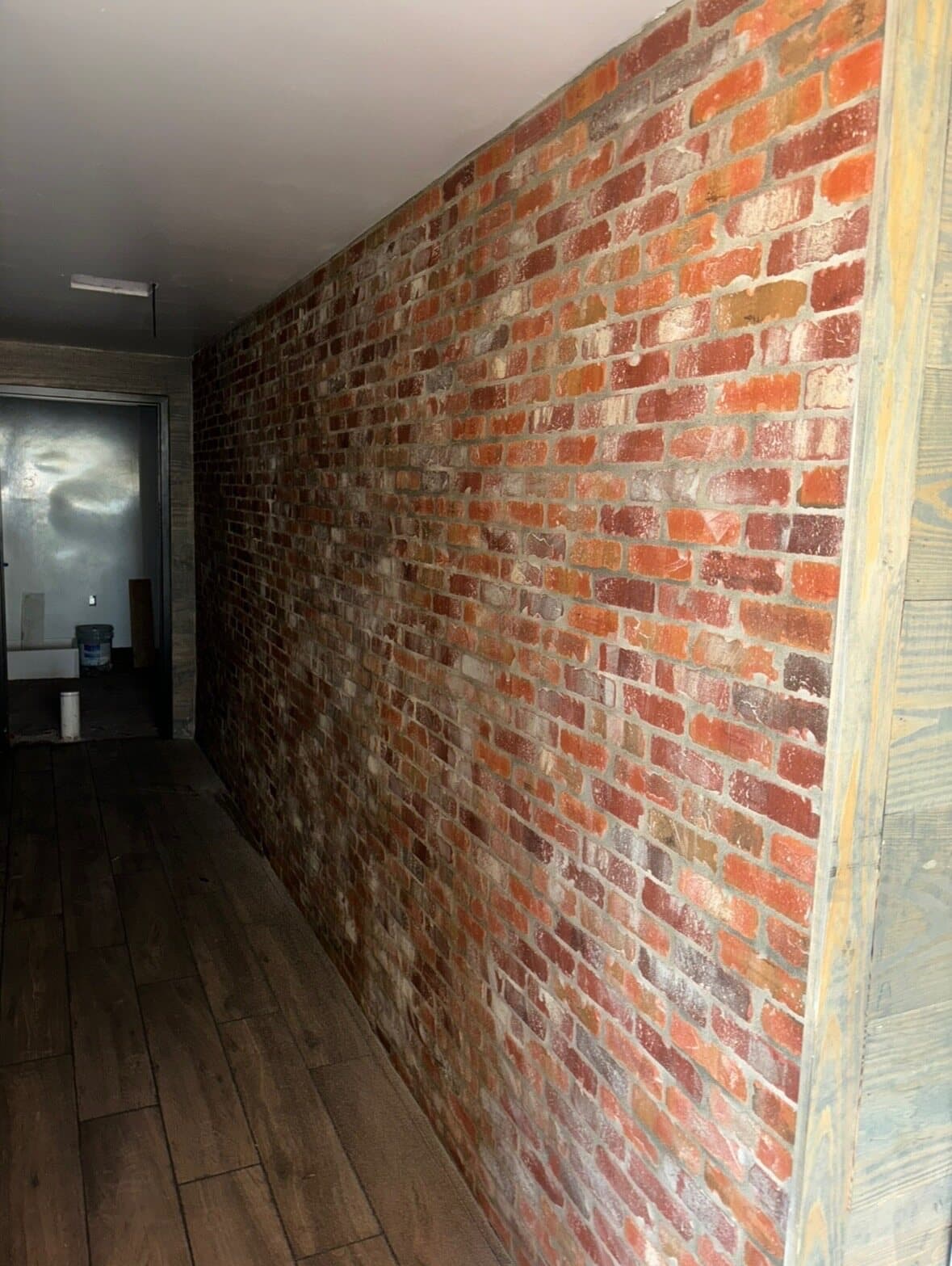 Large-format floor tile installation — commercial project by Sisson Tile