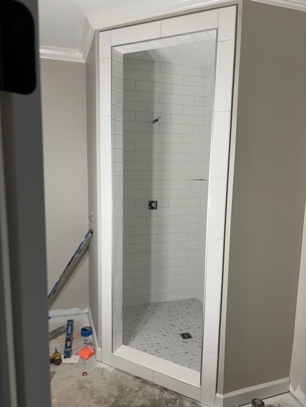Tile prep and layout on commercial job site by Sisson Tile crew by Sisson Tile