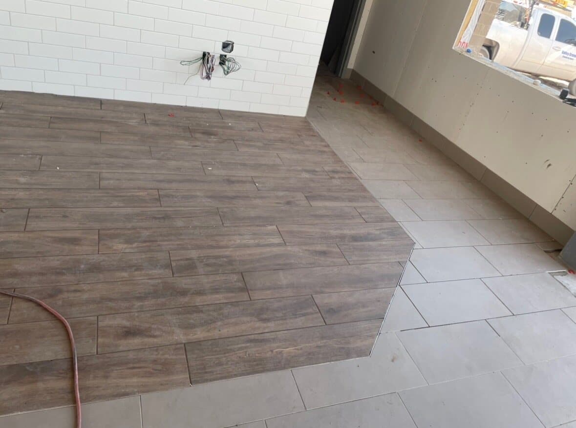 Commercial restaurant tile installation by Sisson Tile — dining area floor and walls by Sisson Tile