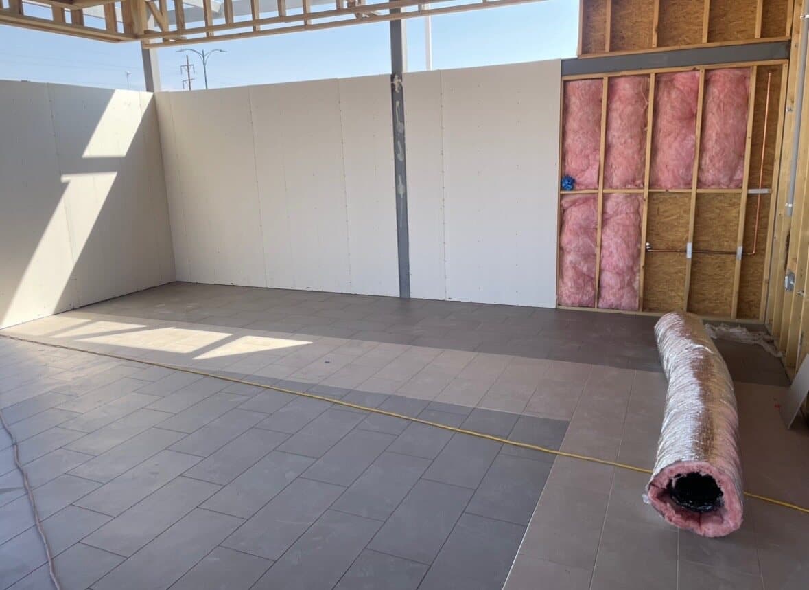 Restaurant floor tile installation in progress by Sisson Tile crew by Sisson Tile