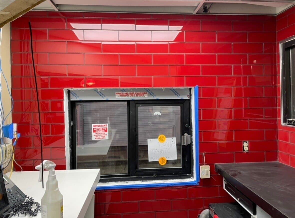 Finished commercial tile floor — large format, clean lines, Sisson Tile by Sisson Tile